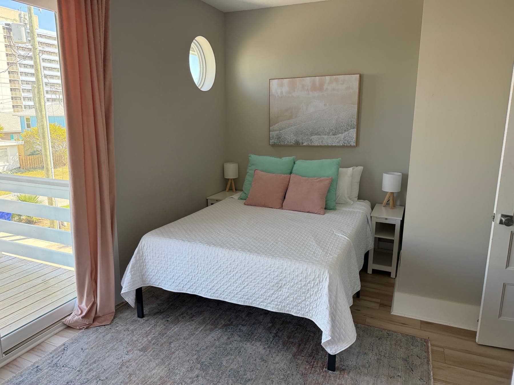 Original bedroom listing photo with dark walls and uneven light before editing